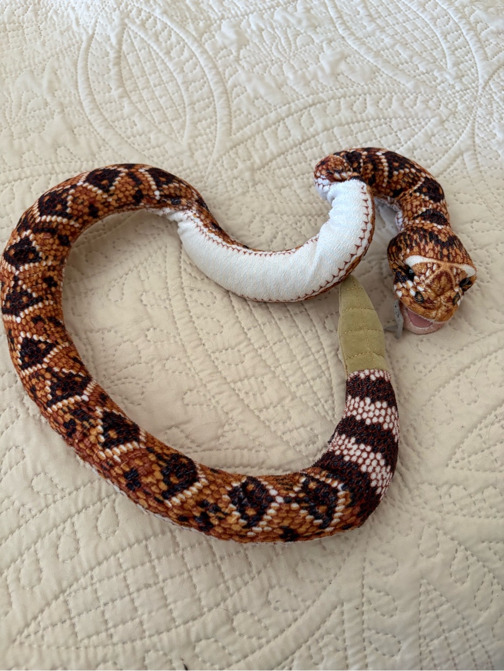 Folkmanis rattlesnake puppet.